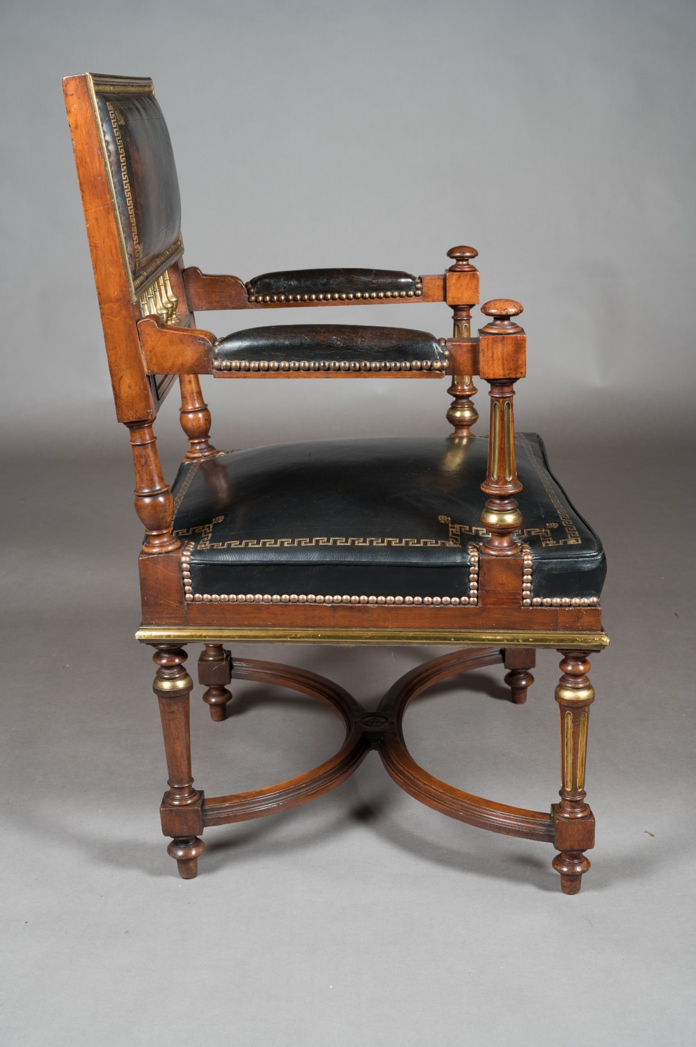 A Matched Pair of 19th Century French Brass Mounted and Leather Armchairs  View XI
