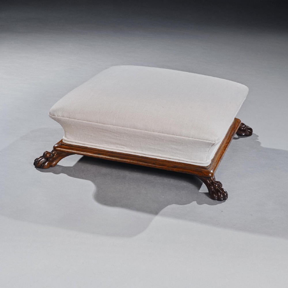 A Fine Regency Period Rosewood Sarcophagus Shaped Foot Stool
