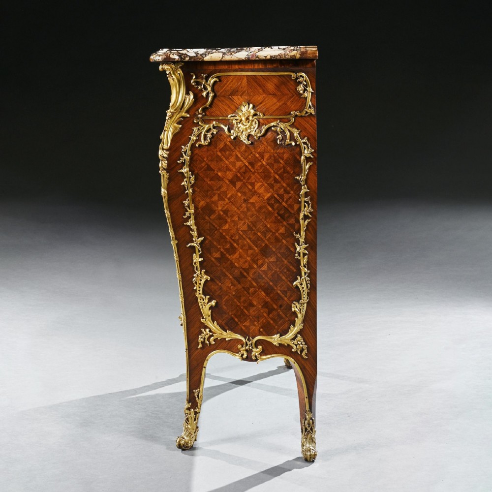 A pair of 19th-century French kingwood petit commodes featuring shaped marble tops, gilt-bronze mounts, cabriole legs, and Vernis Martin hand-painted panels depicting classical figures. View VII