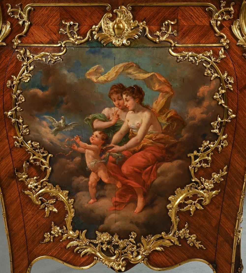 A pair of 19th-century French kingwood petit commodes featuring shaped marble tops, gilt-bronze mounts, cabriole legs, and Vernis Martin hand-painted panels depicting classical figures. View X