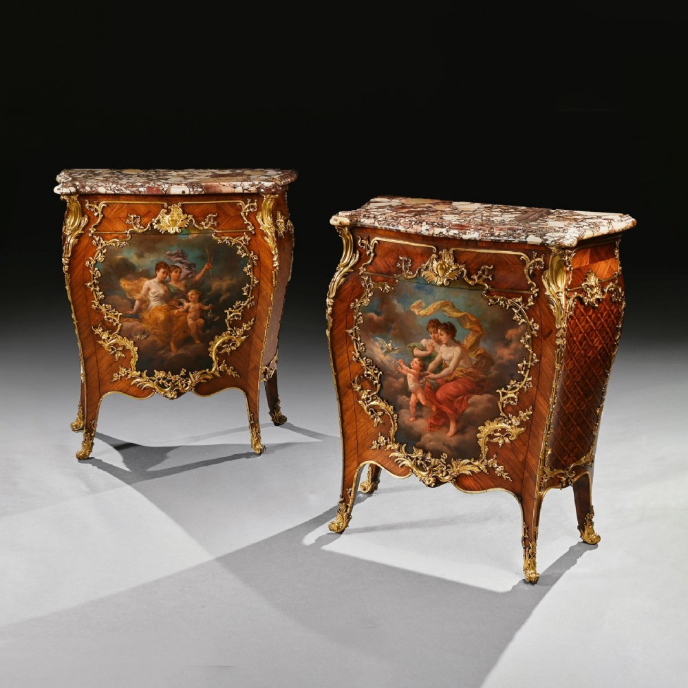A pair of 19th-century French kingwood petit commodes featuring shaped marble tops, gilt-bronze mounts, cabriole legs, and Vernis Martin hand-painted panels depicting classical figures. View XII