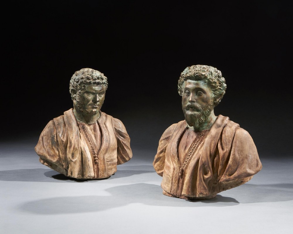 A pair of late nineteenth-century terracotta portrait busts depicting Roman Emperors Marcus Aurelius and Caracalla with verdigris-tinted heads and draped garments. View II