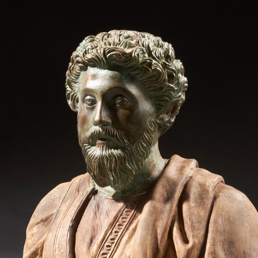 A pair of late nineteenth-century terracotta portrait busts depicting Roman Emperors Marcus Aurelius and Caracalla with verdigris-tinted heads and draped garments. View VI