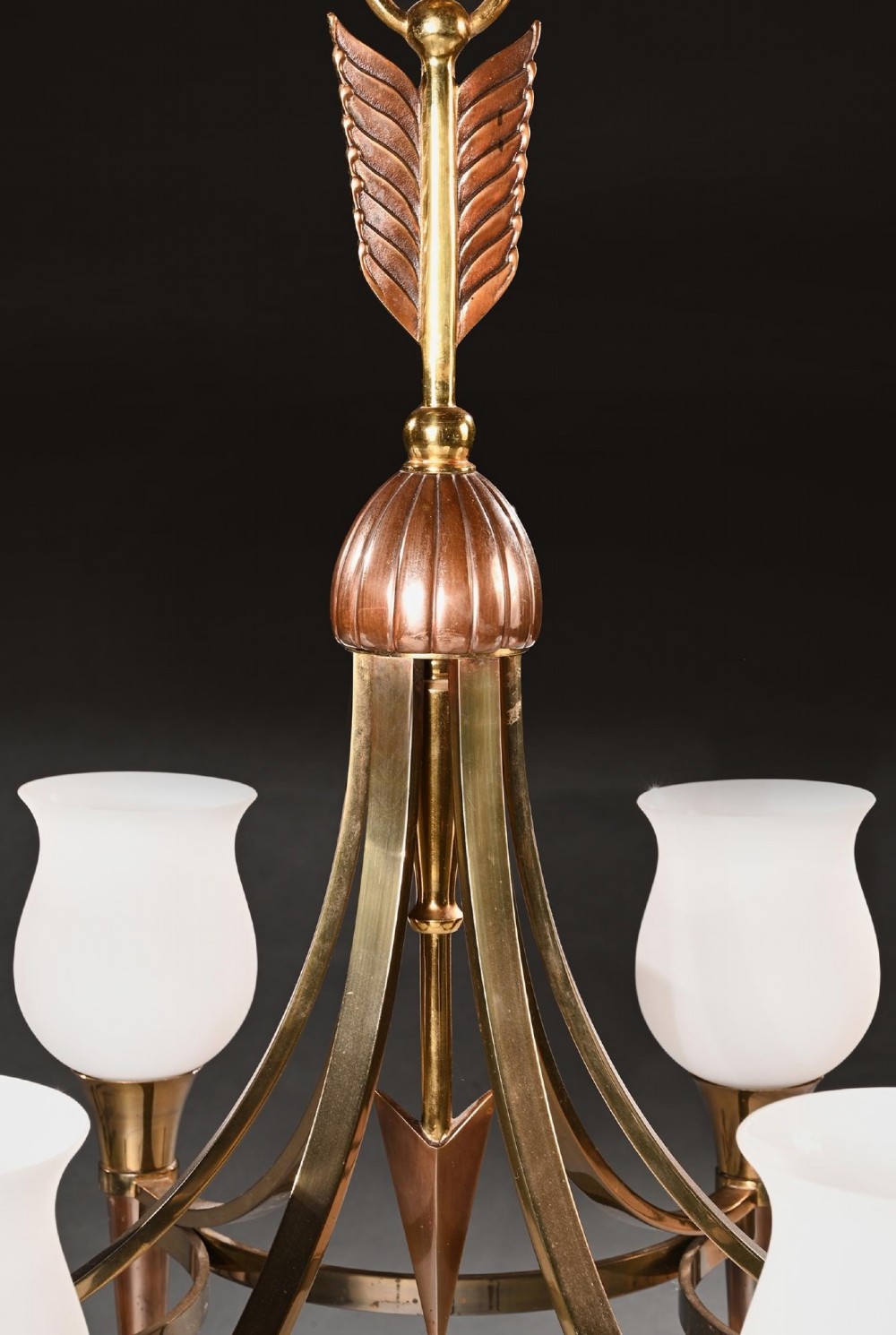 A mid-century brass and copper six-arm chandelier featuring a central arrow motif and frosted tulip glass shades. View III