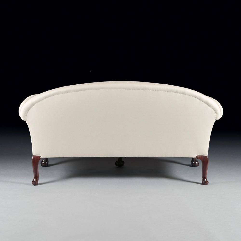 A two-seater sofa upholstered in off-white calico fabric featuring carved dark mahogany cabriole legs with ball and claw feet. View III