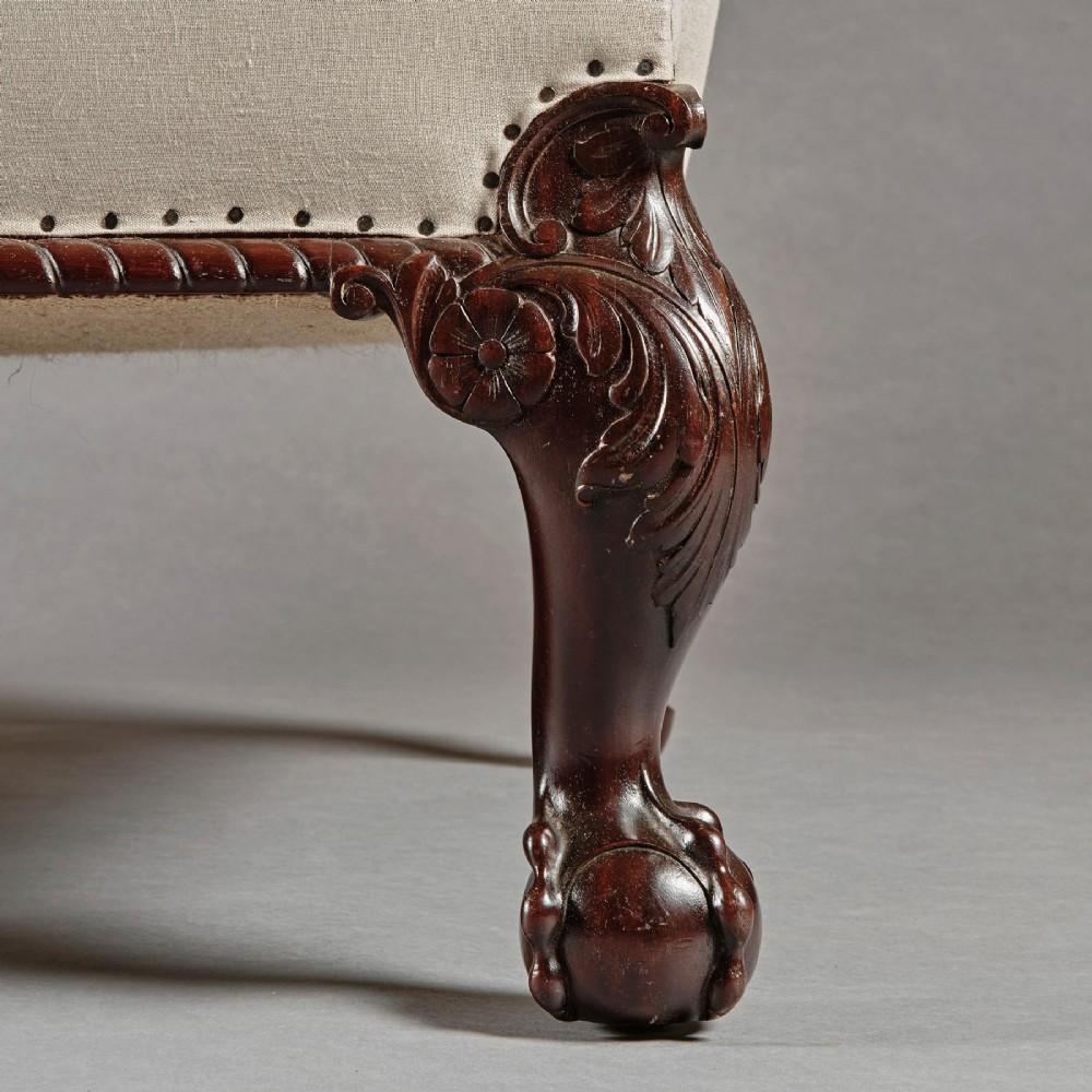 A two-seater sofa upholstered in off-white calico fabric featuring carved dark mahogany cabriole legs with ball and claw feet. View VI