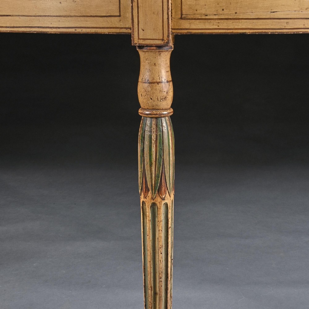 A Georgian painted demi-lune pier table featuring a semi-circular top with polychrome painted borders and four fluted tapered legs. View VII