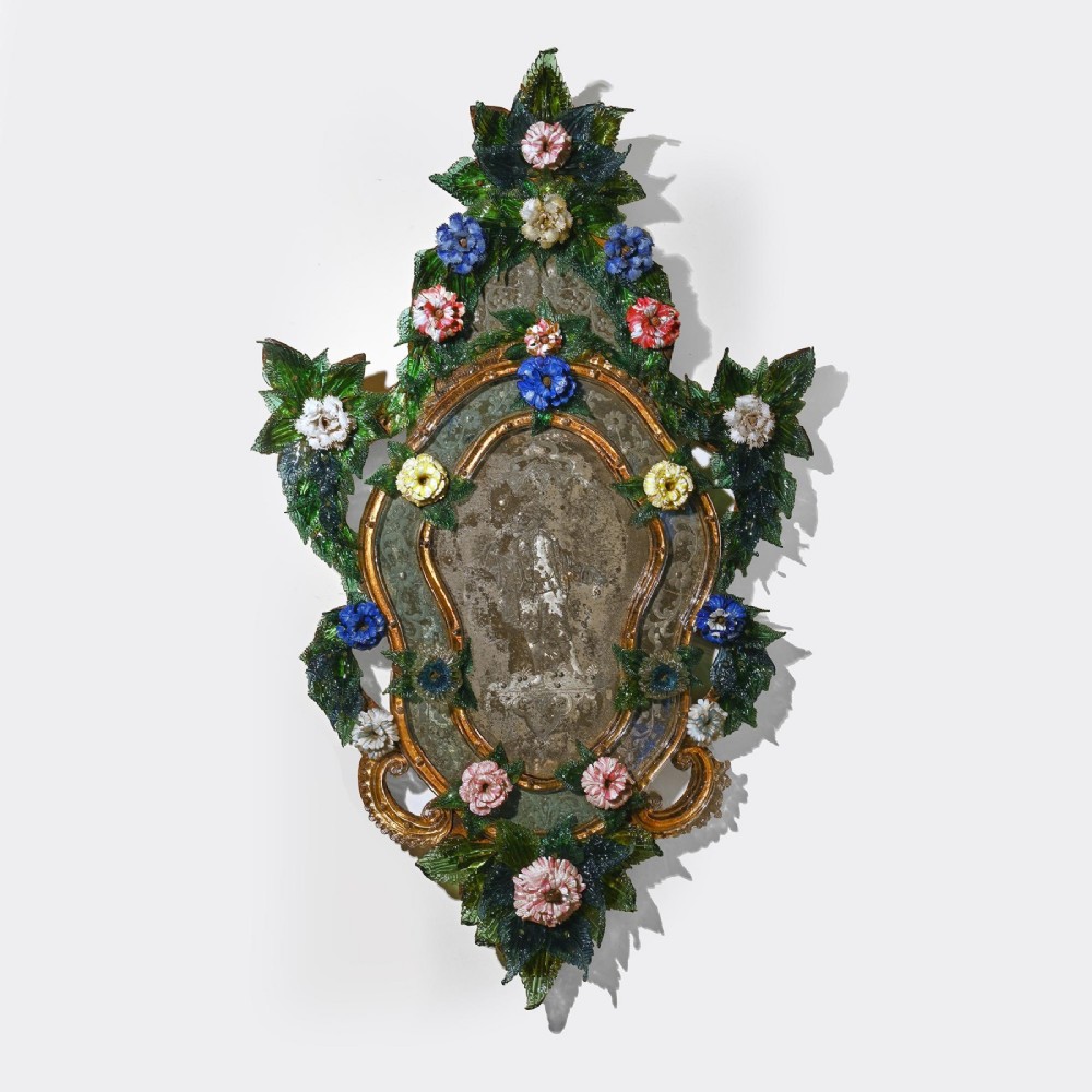 A pair of 18th-century Venetian Murano glass wall mirrors featuring decorative glass foliage, colourful glass flowers, etched central mirror plates, and gilt accents. View II
