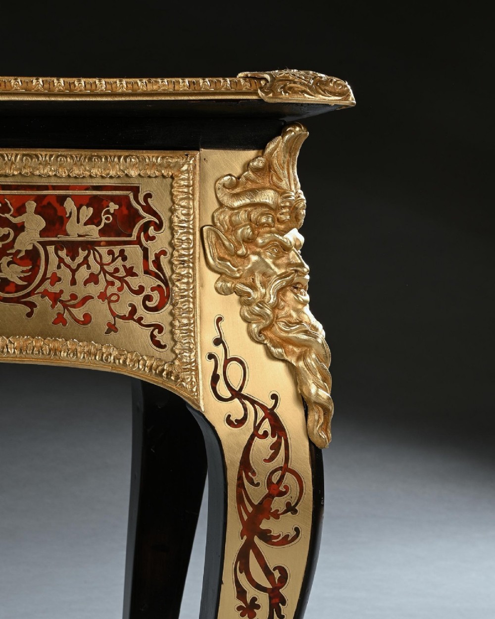 A George IV period Boulle marquetry games table featuring brass and tortoiseshell inlay, gilt-bronze mounts, cabriole legs, and an inlaid chessboard top. View VI