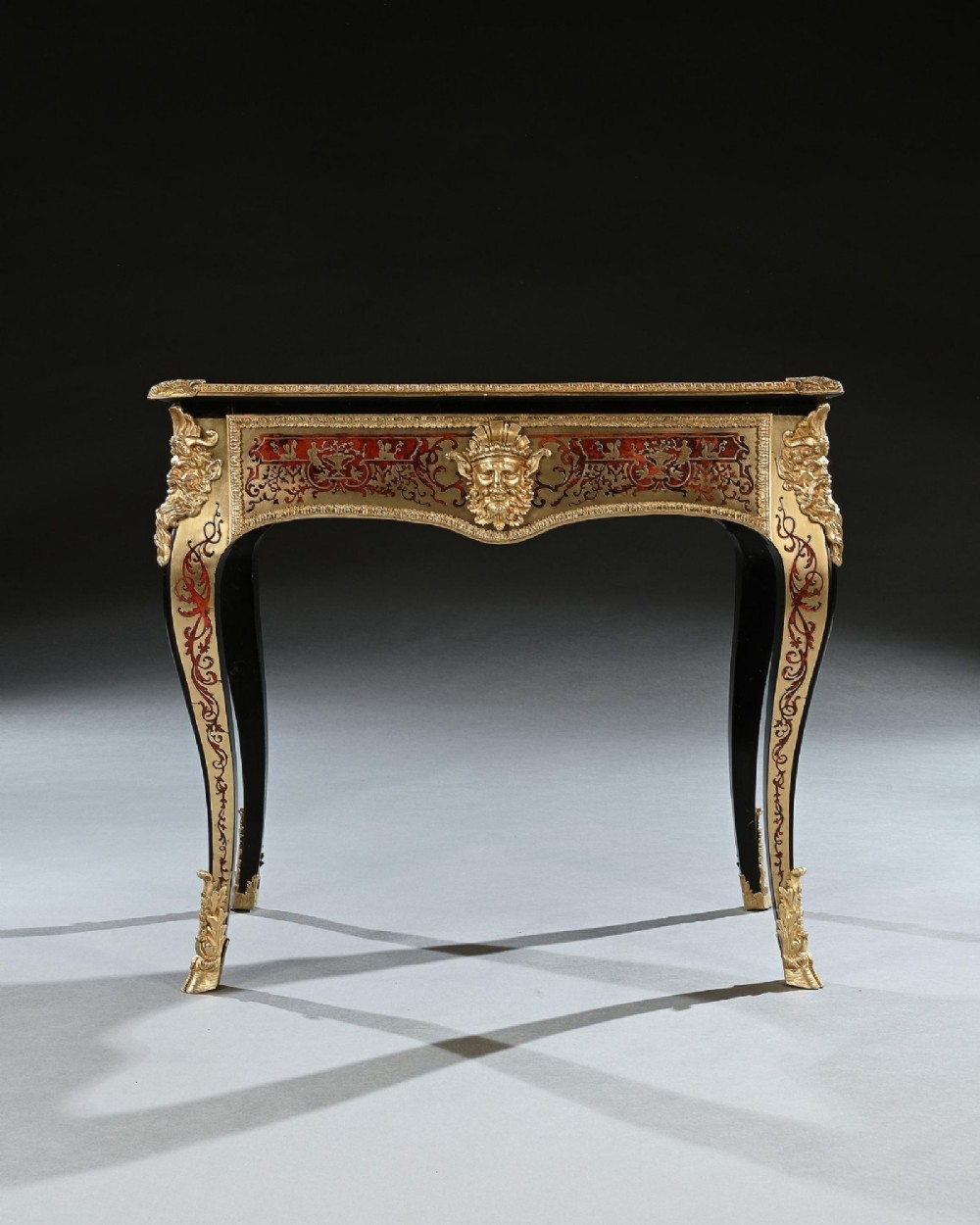 A George IV period Boulle marquetry games table featuring brass and tortoiseshell inlay, gilt-bronze mounts, cabriole legs, and an inlaid chessboard top. View VIII