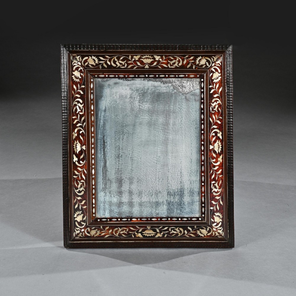 A pair of 18th-century rectangular wall mirrors featuring rich brown tortoiseshell frames intricately inlaid with mother-of-pearl floral motifs. View II