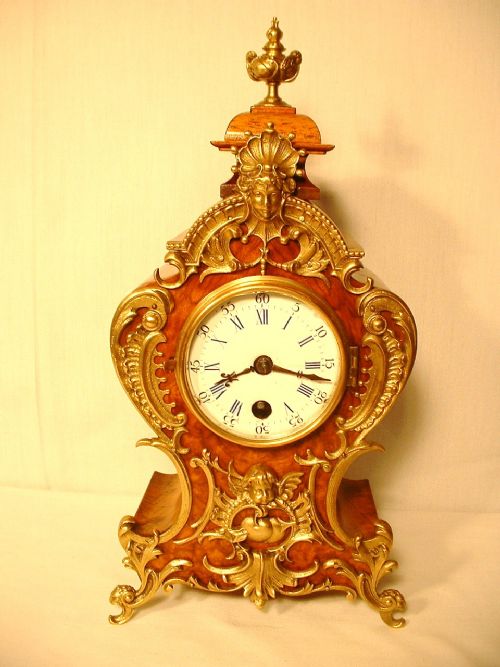 fig 1. Walnut and Gilded Boulle Clock