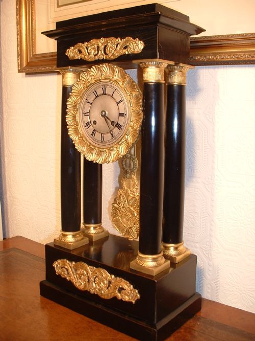 fig 1. Ebonised & Gilt Portico Clock