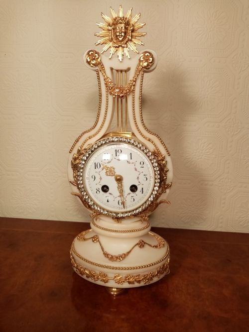 Outstanding Lyre Clock by Vincenti of Paris.