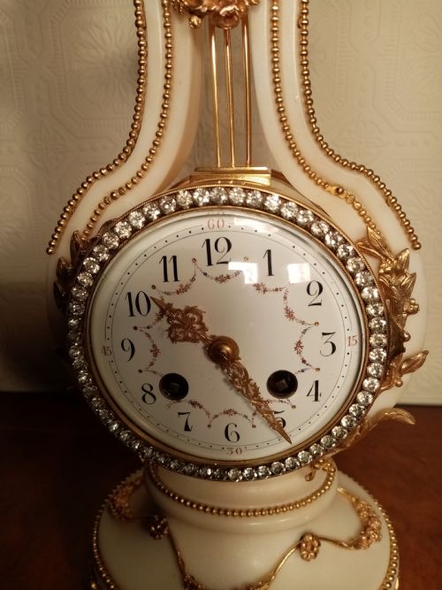 fig 1. Outstanding Lyre Clock by VINCENTI of PARIS.