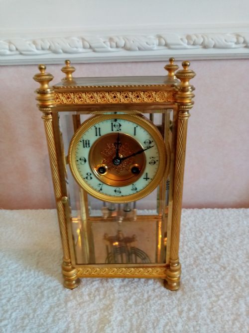 Gilt Four-glass-sided Table/bracket Clock. Fabrique of Paris.