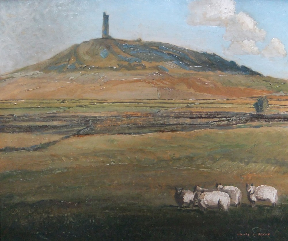 A framed oil painting depicting Castle Hill in Huddersfield with sheep grazing in a green pastoral field beneath a pale sky. View V
