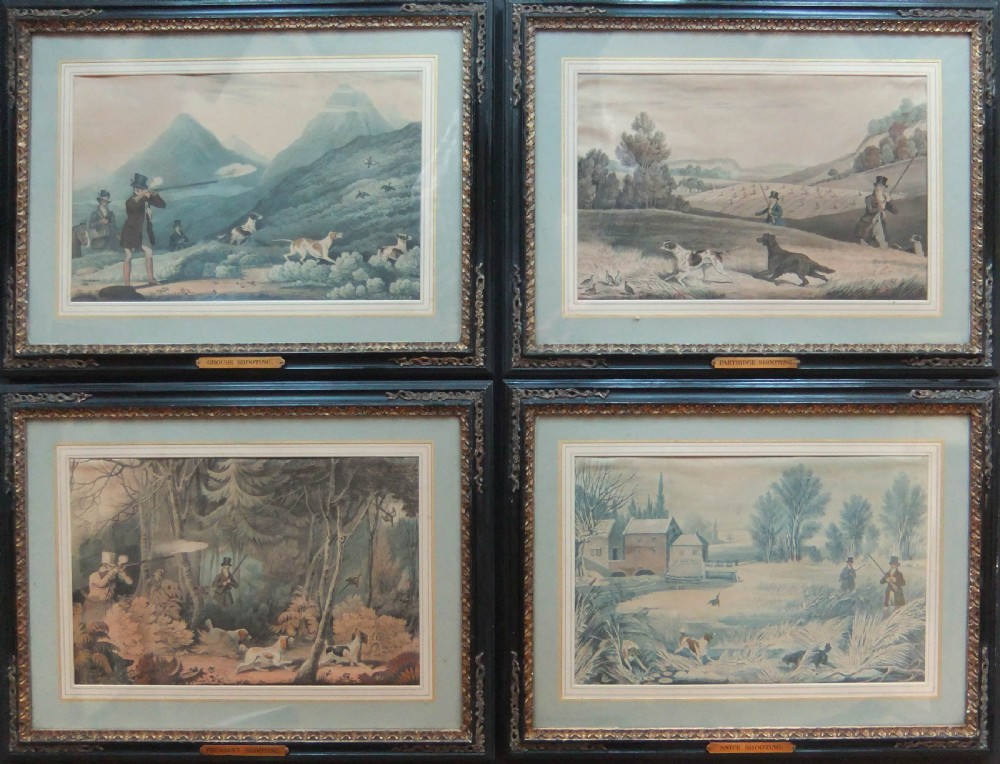 A set of four framed nineteenth-century sporting prints depicting game bird shooting scenes set within dark moulded frames with gilt details.