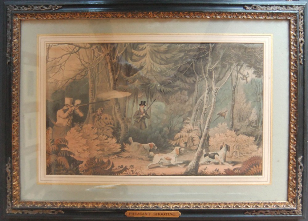 A set of four framed nineteenth-century sporting prints depicting game bird shooting scenes set within dark moulded frames with gilt details. View IV