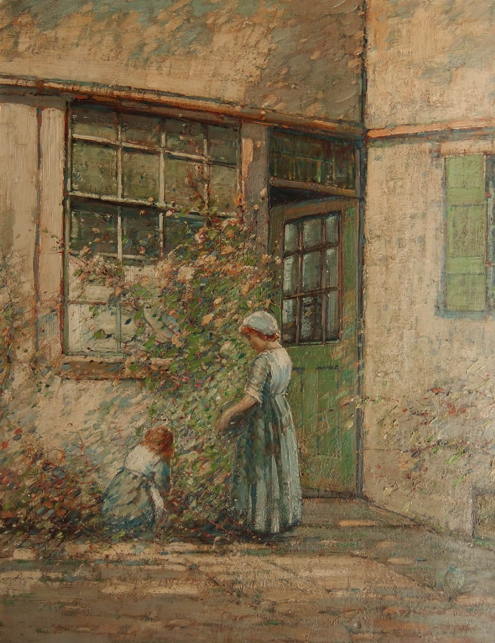An Impressionist oil painting featuring two young children in aprons tending to climbing foliage beside a green cottage door.