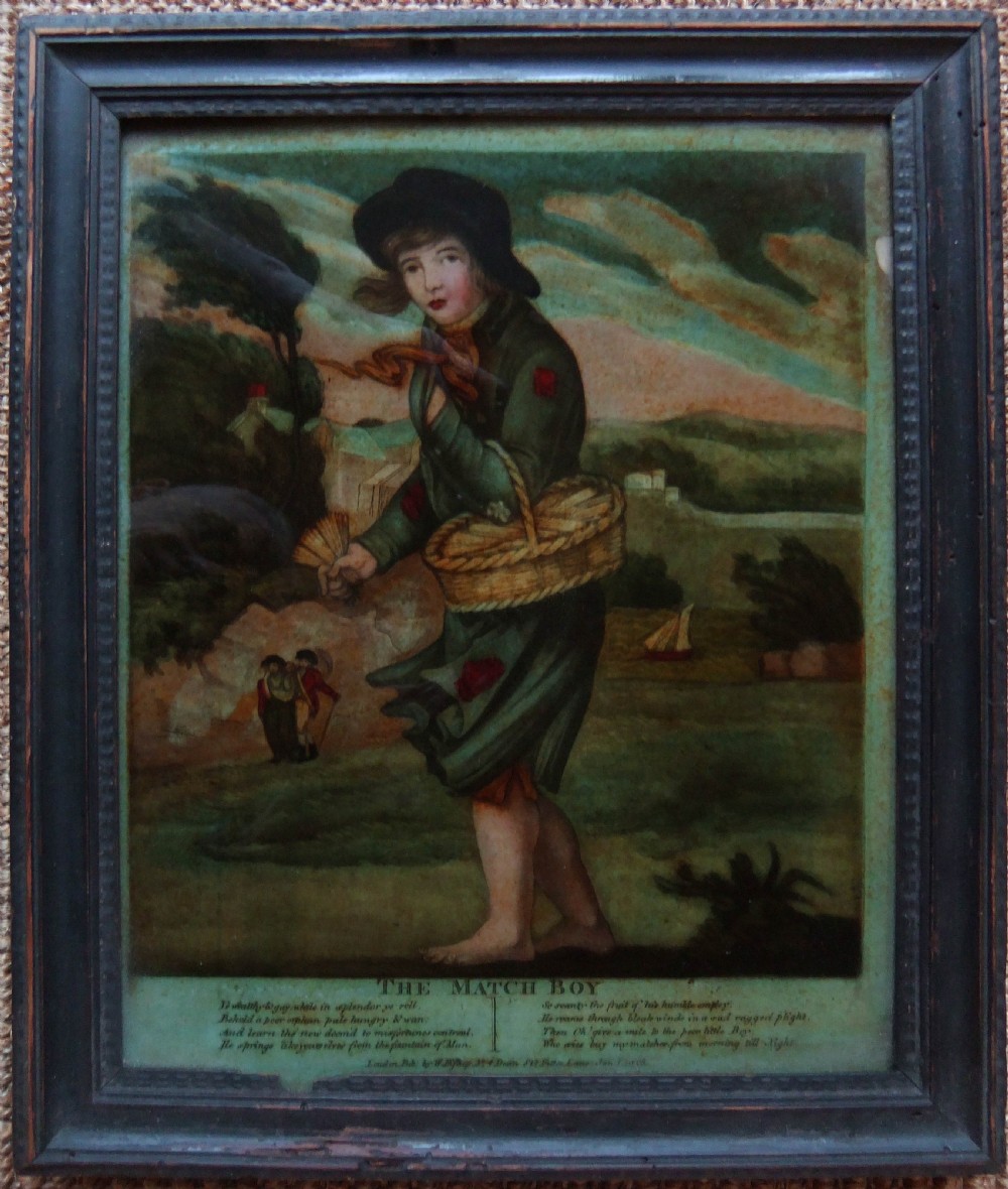 A Georgian reverse mezzotint print on glass housed in a dark wooden frame, depicting a young match vendor in a landscape.