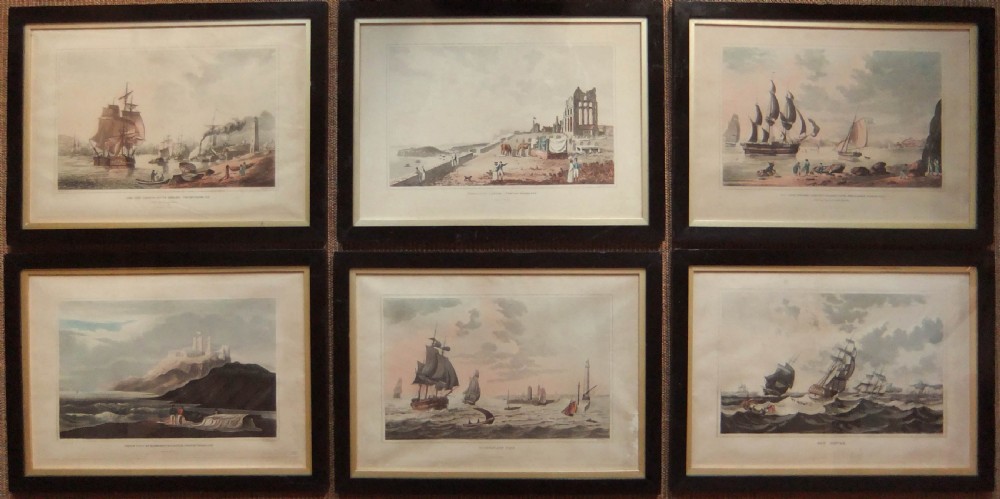 A set of six framed nineteenth-century aquatint prints depicting British coastal, harbour, and maritime shipping scenes arranged in two rows of three.