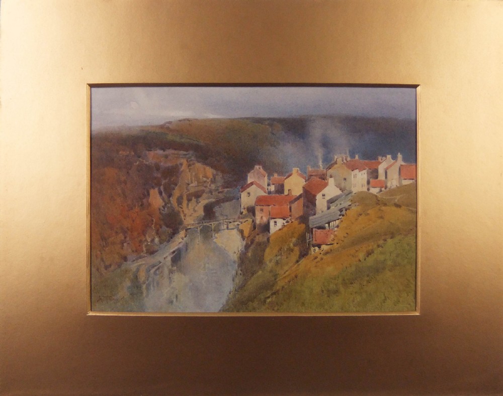 An original watercolour painting depicting a cliffside village with red-roofed cottages and a bridge over a river valley by Arthur Tucker. View II