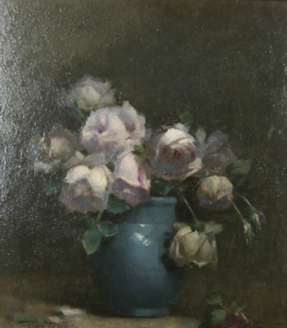 An oil painting depicting an arrangement of pale cream and pink roses in a small blue ceramic vase set against a dark muted background.