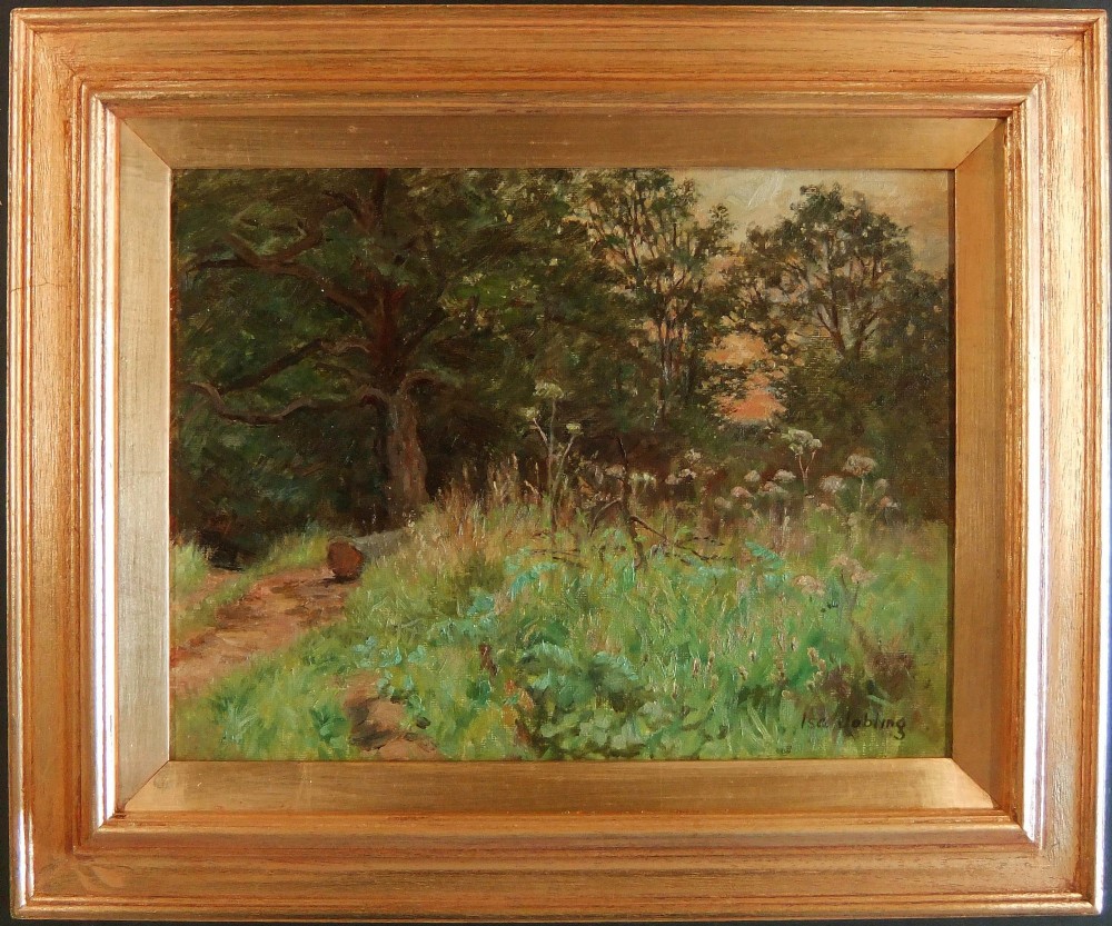 An oil painting depicting a sunlit woodland path flanked by dense trees, tall grasses, and wild flora, signed by Isa Jobling in the lower right corner. View II