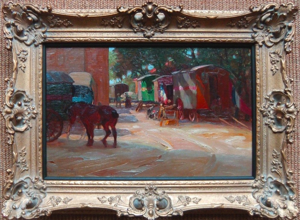 An impressionist oil painting depicting a horse standing near wooden traveller caravans with figures and French flags in a shaded outdoor setting. View II