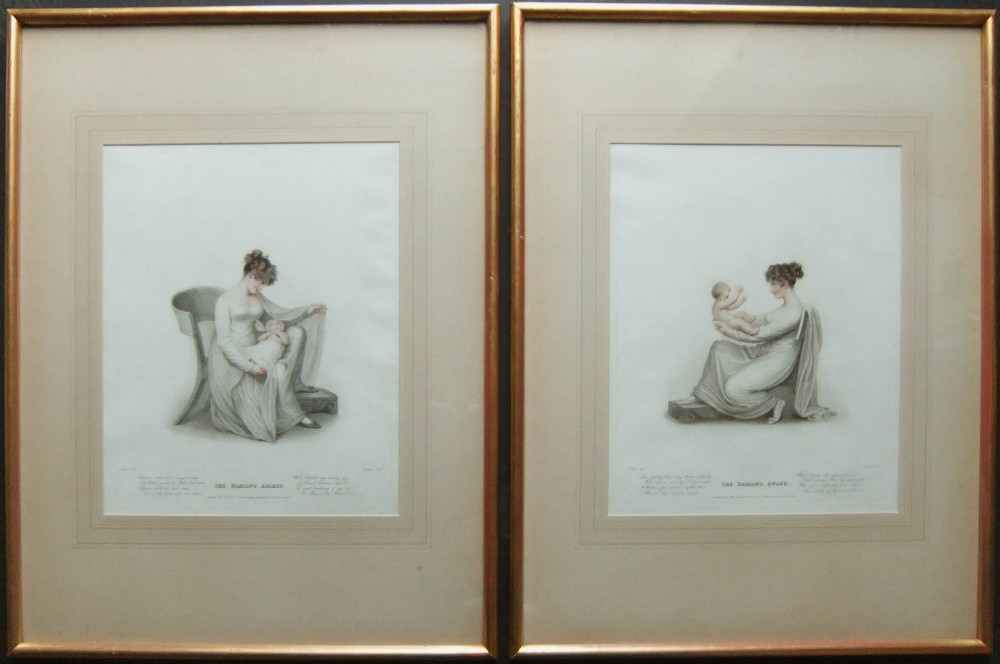 A pair of framed Regency stipple engravings depicting a mother and child in classical attire within gilt frames.