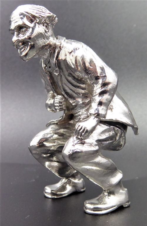 extremly rare if not unique solid silver man squatting with gold coin 18k - CATEGORY: ANTIQUE SILVER - DATED 1950