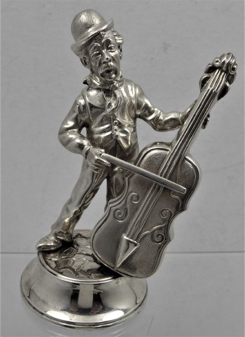 solid cast silver muscian figure - CATEGORY: ANTIQUE SILVER - DATED 1960