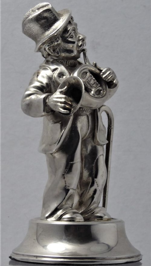 SOLID CAST SILVER MUSICIAN - ADDITIONAL PHOTO 1