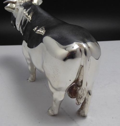 SOLID CAST SILVER FIGURE OF A BULL - ADDITIONAL PHOTO 2
