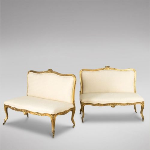 A Pair of 19th Century Gilt and Upholstered Banquettes.