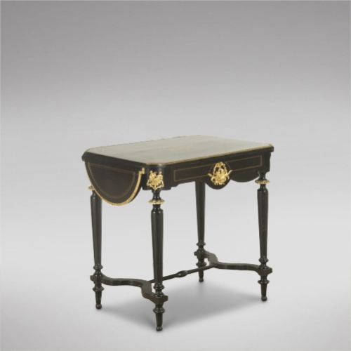 A French Ebonised and Gilt Centre Table