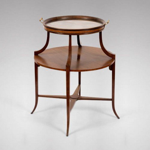 An Edwardian Mahogany Circular Two-tier Table