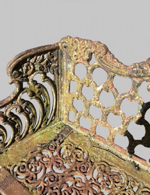 A LOVELY ANTIQUE CAST IRON GARDEN SETTEE - ADDITIONAL PHOTO 4