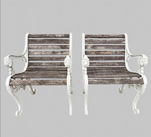 A PAIR OF LION MASK CAST IRON GARDEN ARMCHAIRS C1930