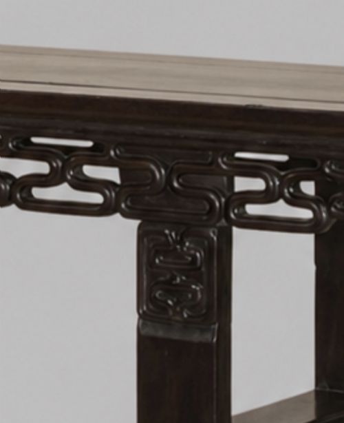 fig 3. A late 19th-century Chinese dark hardwood altar table with an openwork geometric carved apron and recessed leg stretchers.