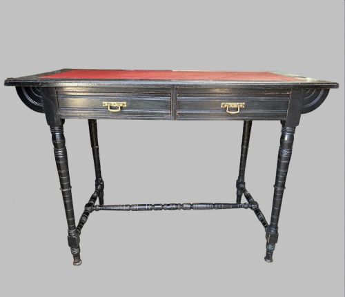 AN ATTRACTIVE LATE VICTORIAN EBONISED WRITING DESKSIDE TABLE