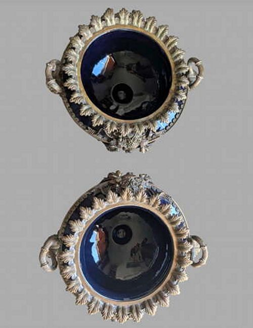 fig 1. A pair of 19th-century dark blue ceramic jardinieres featuring ornate gilt metal mounts, dual scroll handles, and flared pedestal bases.