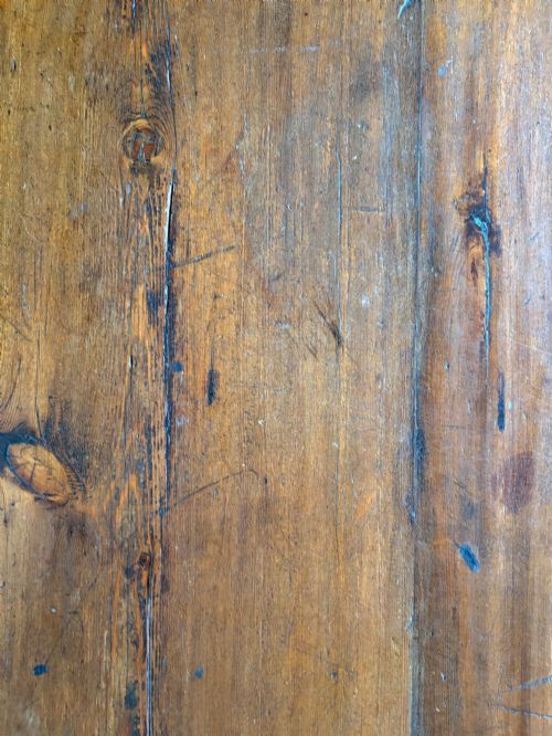 fig 6. An antique Swedish provincial pine farmhouse table featuring an oval plank top, frieze with drawer moulding, turned baluster legs, and a low rectangular box stretcher.