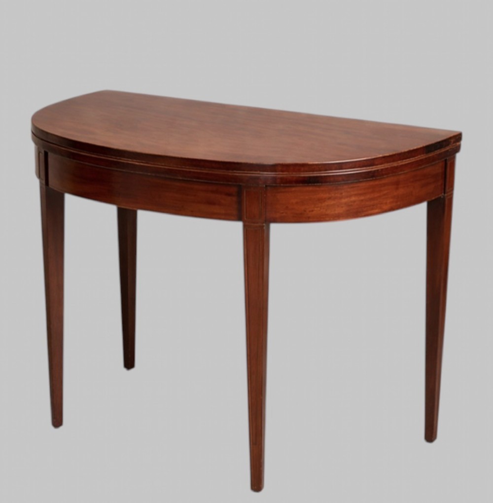 Late 19th Century Georgian Revival Mahogany fold over Tea Table with stringing