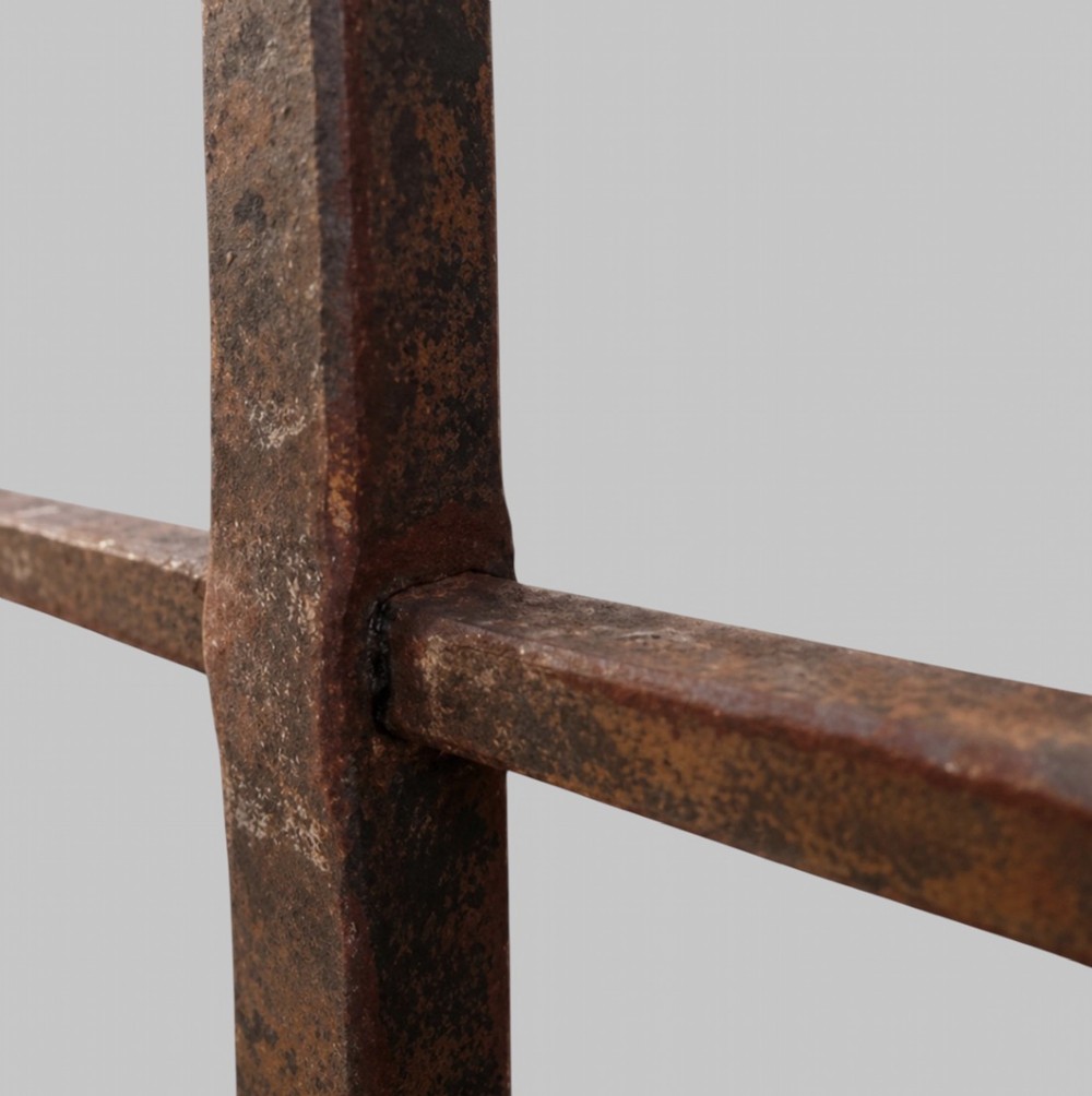 A tall dark wrought iron floor candelabrum featuring a triangular frame with fifteen candle sockets set upon a twisted central stem and tripod base. View III