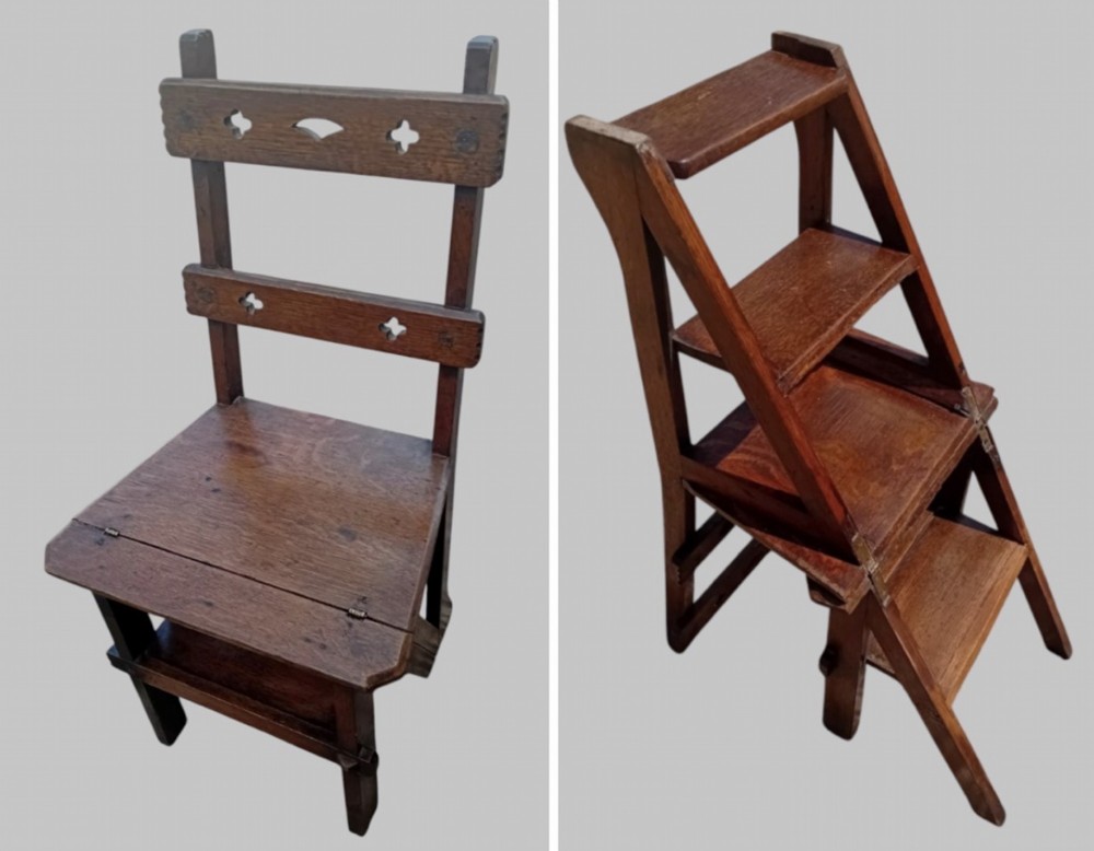 A late Victorian dark oak metamorphic chair featuring pierced trefoil cutouts on the backrest that hinges open to transform into a set of three library steps.