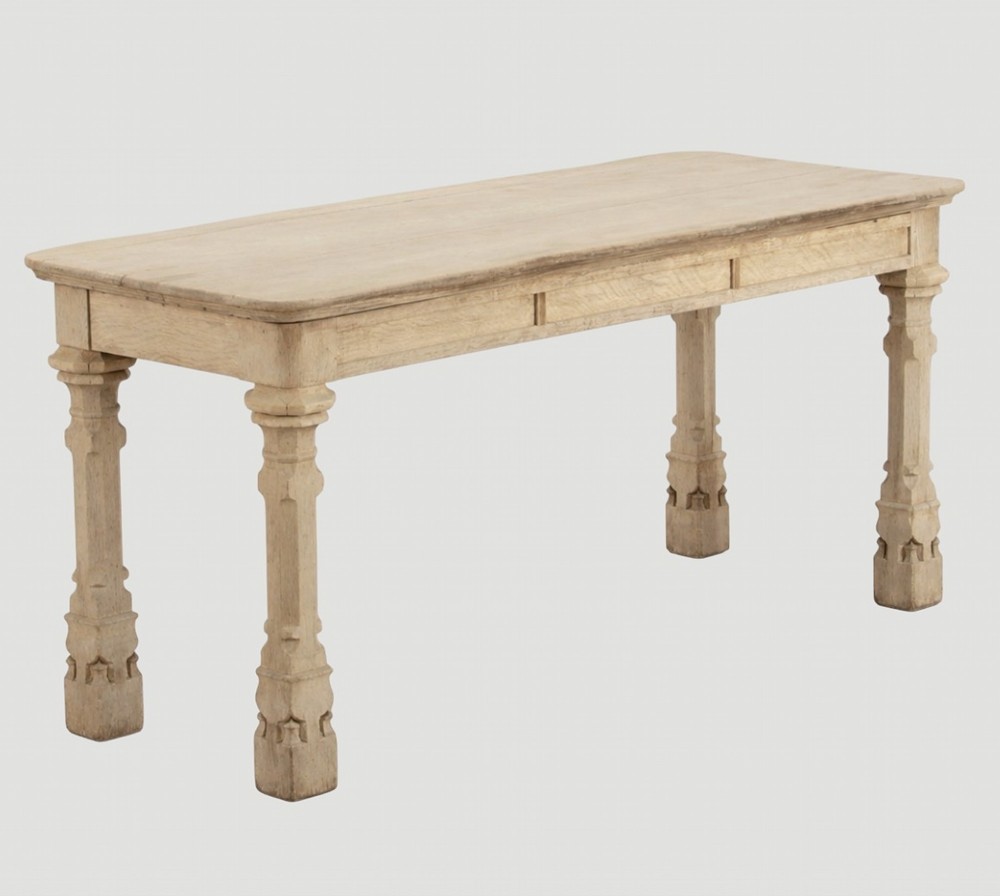 An early nineteenth-century bleached oak hall table featuring carved column supports and a plain rectangular top. View II