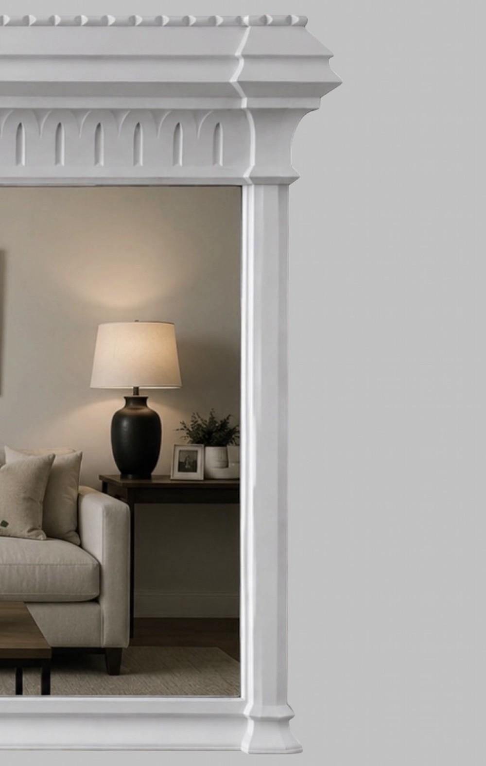 A large late Victorian rectangular overmantel mirror featuring a white painted wooden frame with a prominent corniced top and carved moulding. View IV