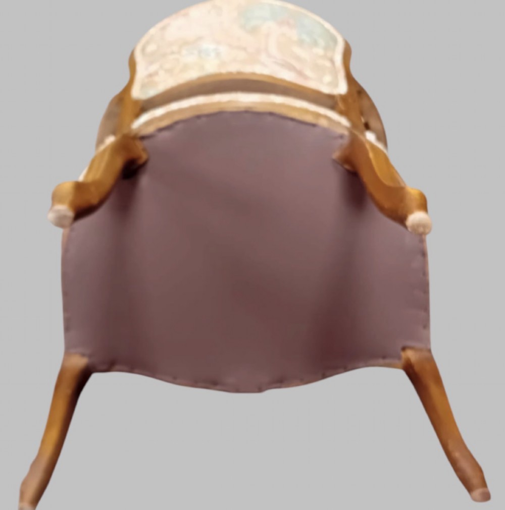 A pair of Neo-Rococo open armchairs featuring carved wooden frames, cabriole legs, and botanical tapestry upholstery. View VIII